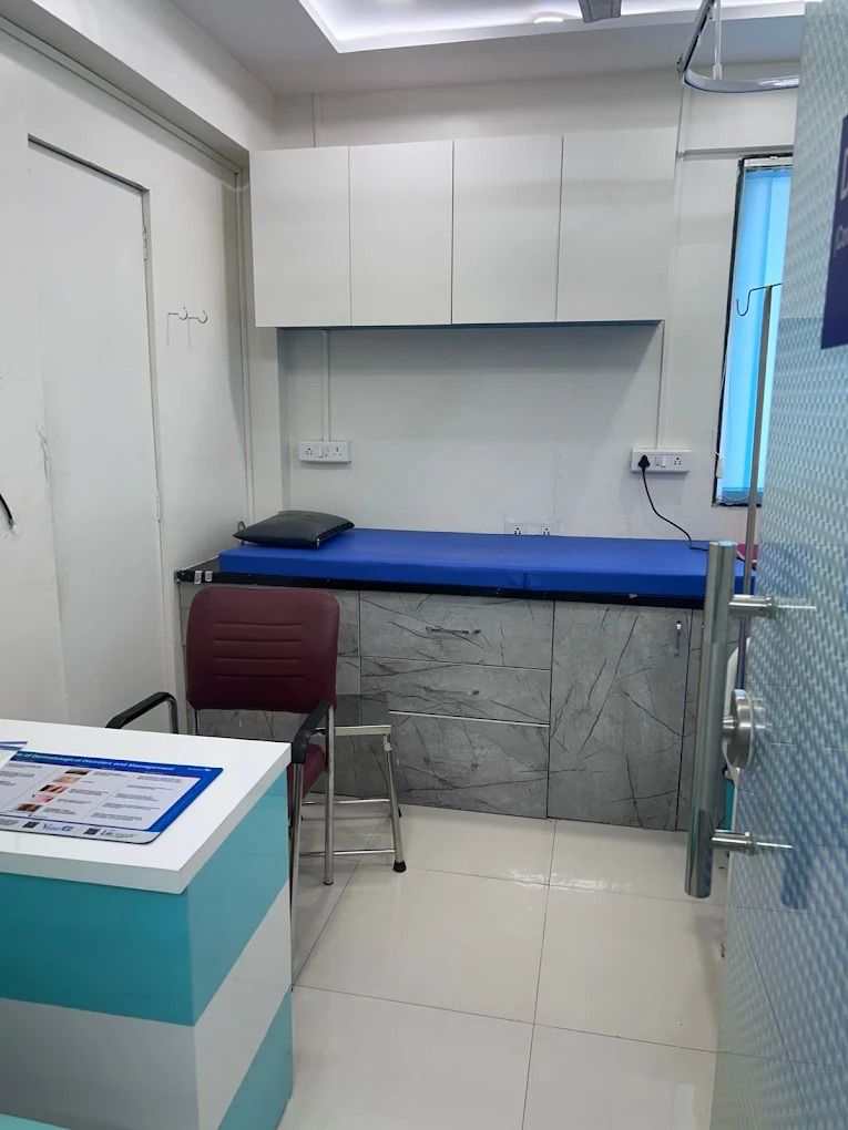 Examination room with patient bed